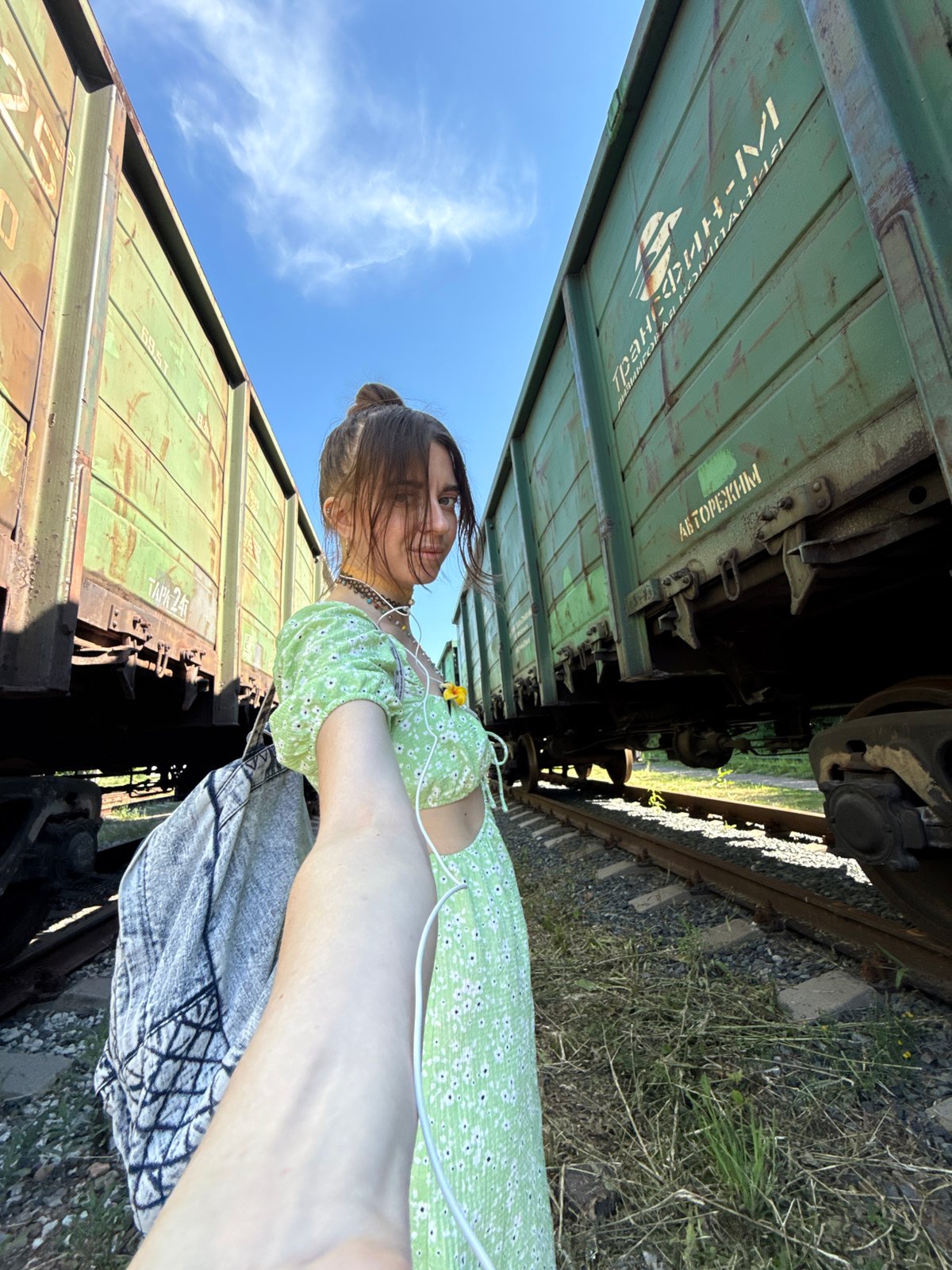 Selfies and detail shots at a sunny railway yard