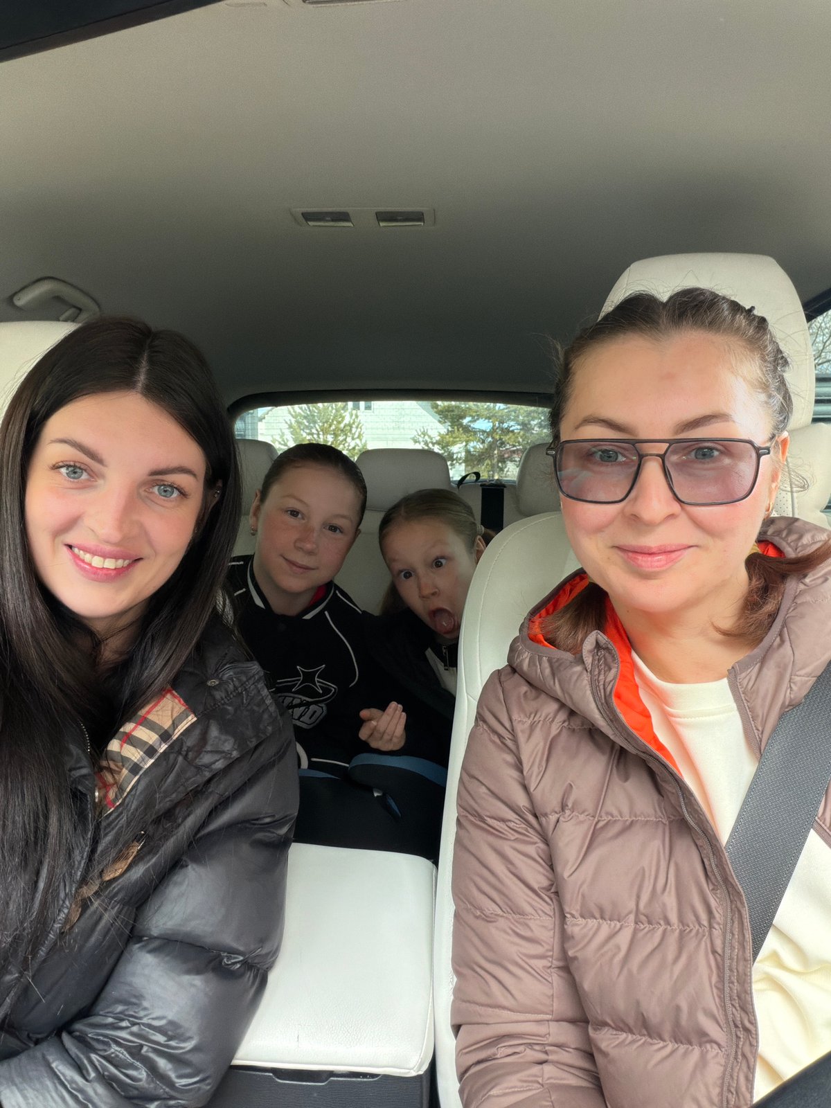 Four people photographed in vehicle in Markovo, Russia