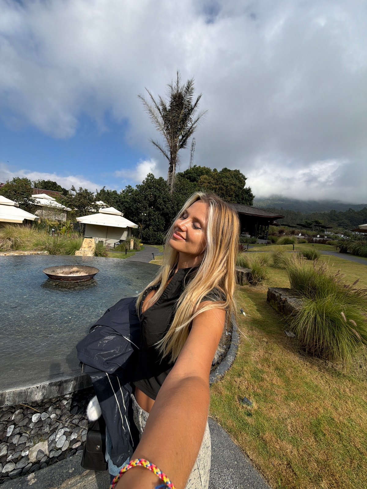 Selfies at a scenic lakeside fire pit spot in Kintamani
