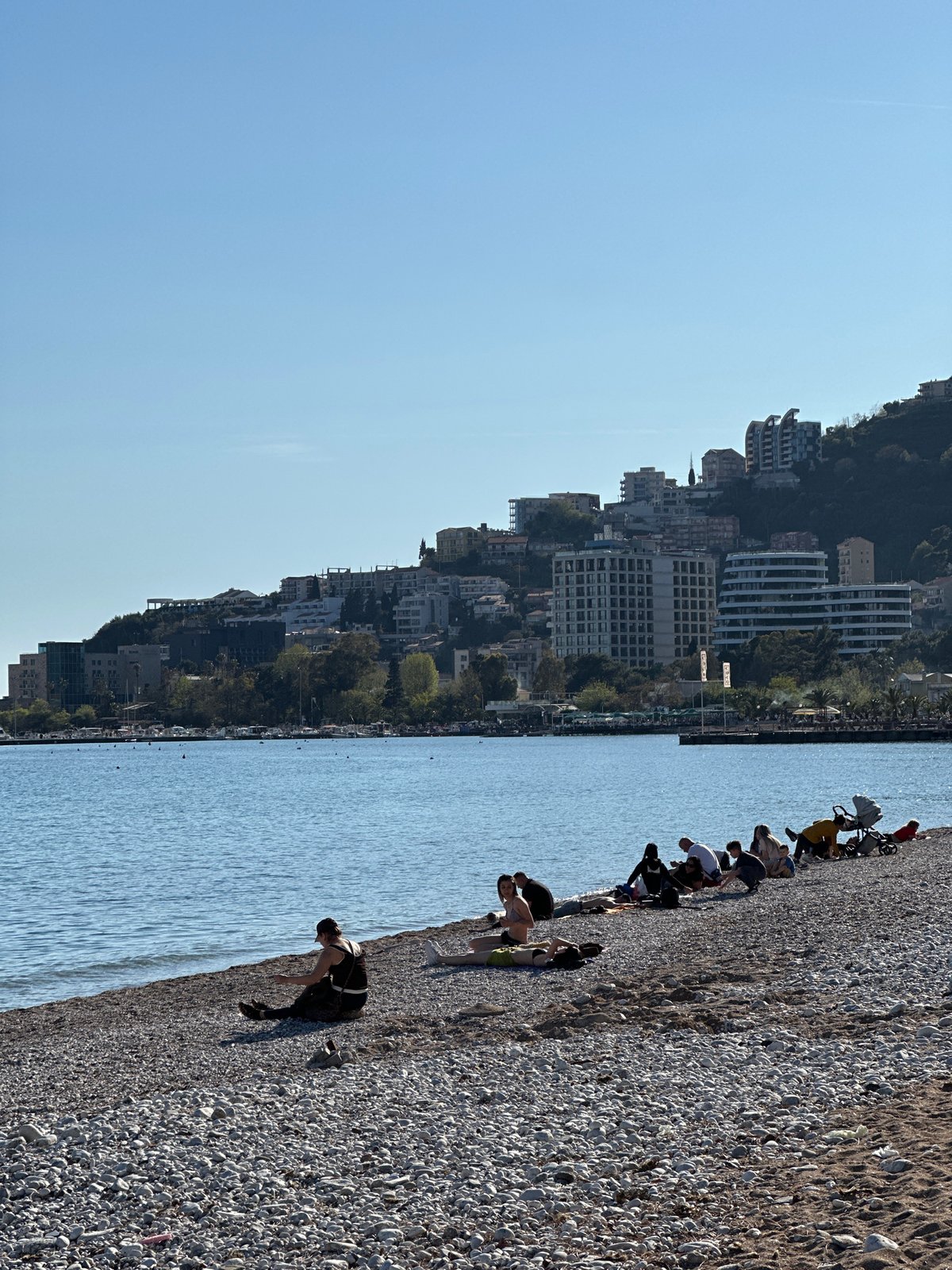 Everyday life documented across Budva, Montenegro during sunny afternoon