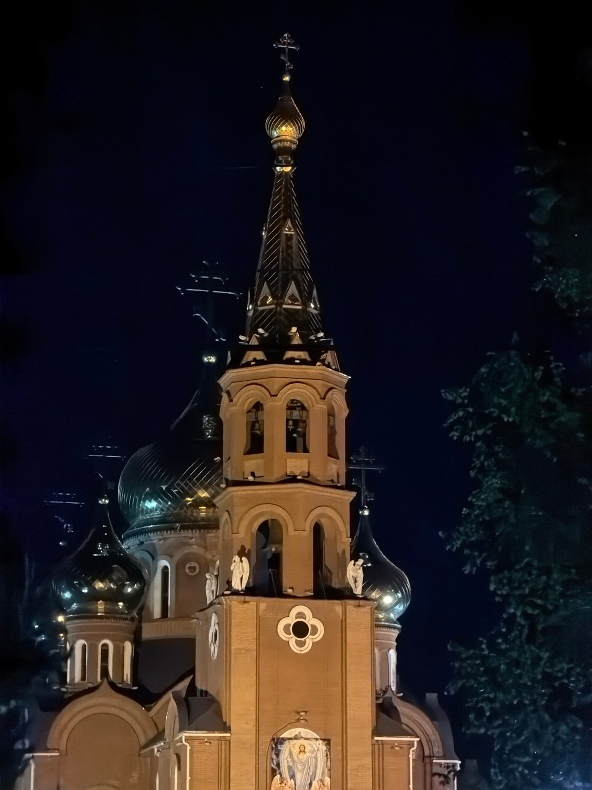 Evening documentation of illuminated Orthodox churches in Chaikovsky, Russia