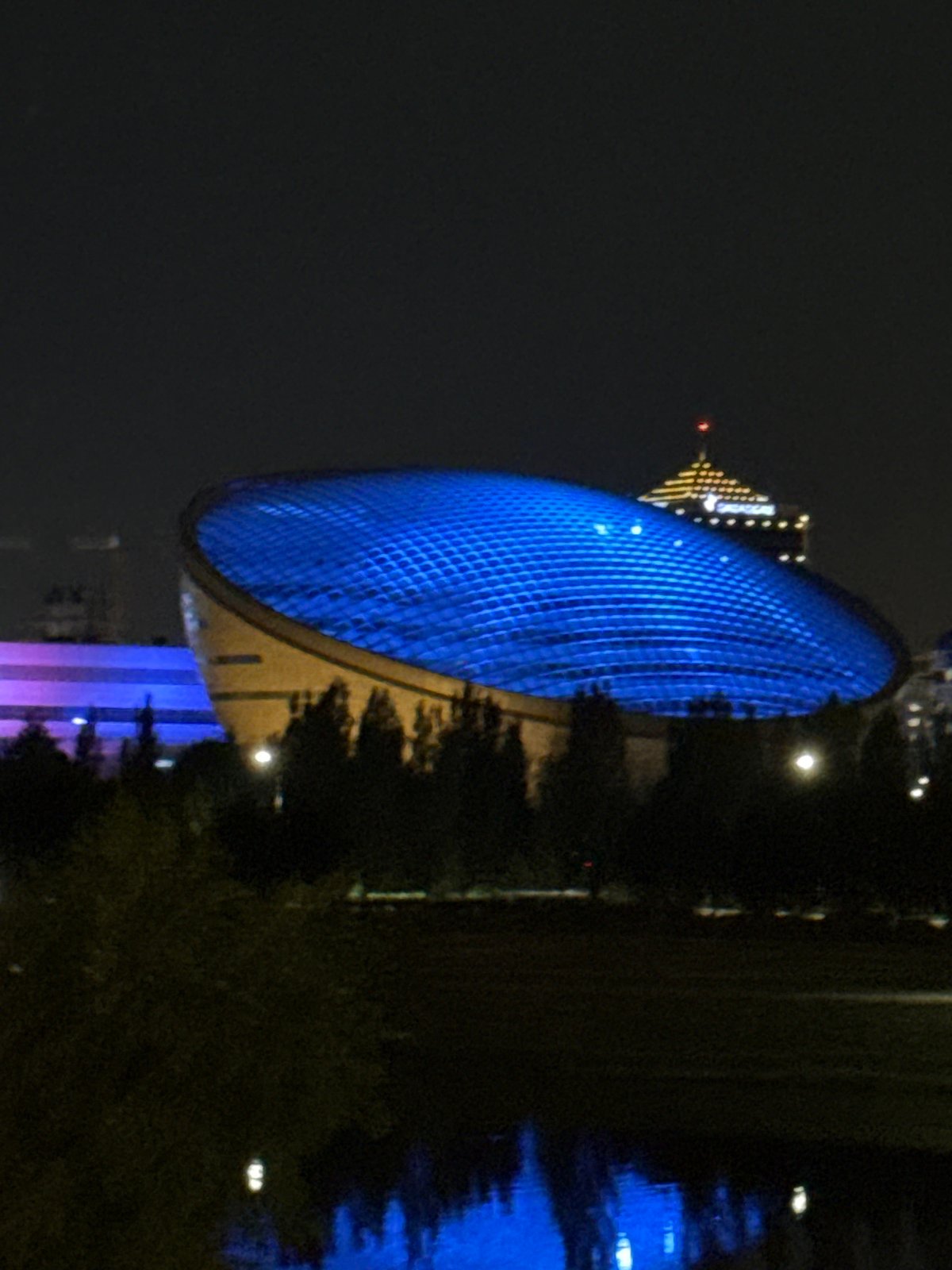 Nighttime stroll through Astana's illuminated modern landmarks