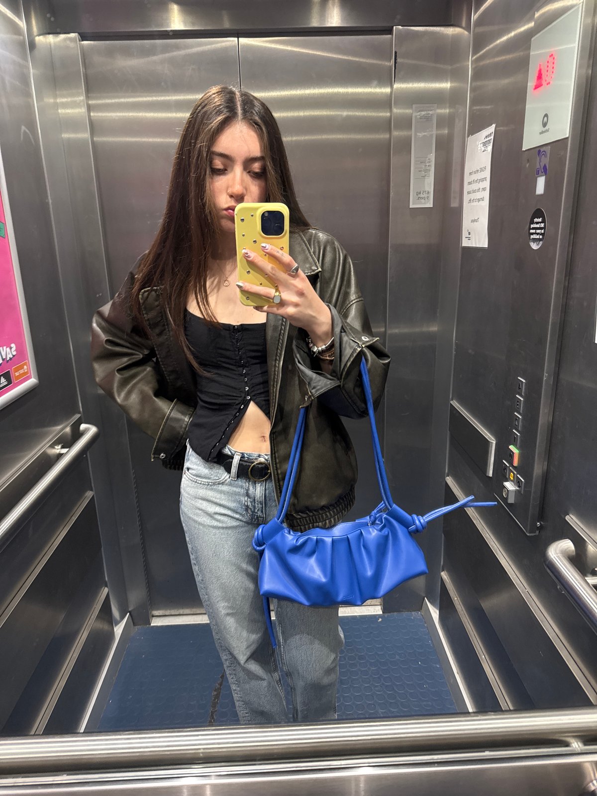 Woman takes elevator selfie in Hull