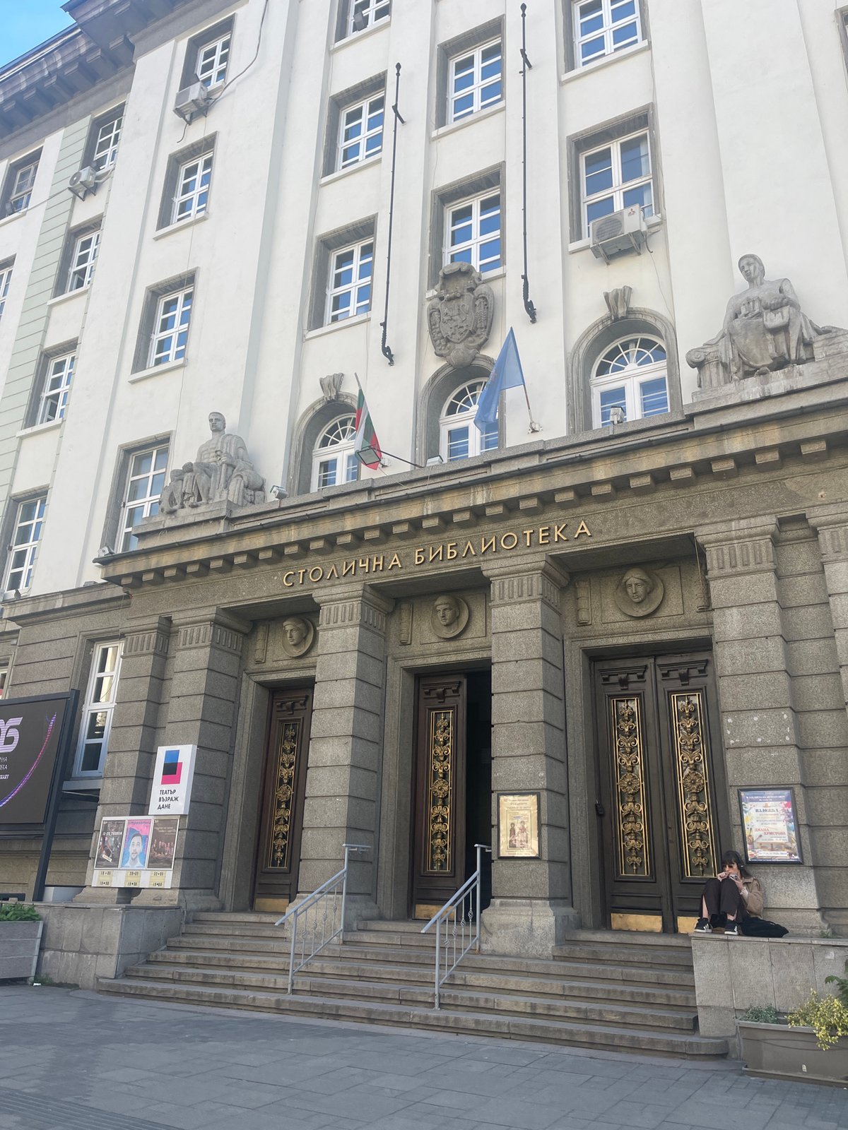 Tourist documents Sofia landmarks, tram system during midday walk