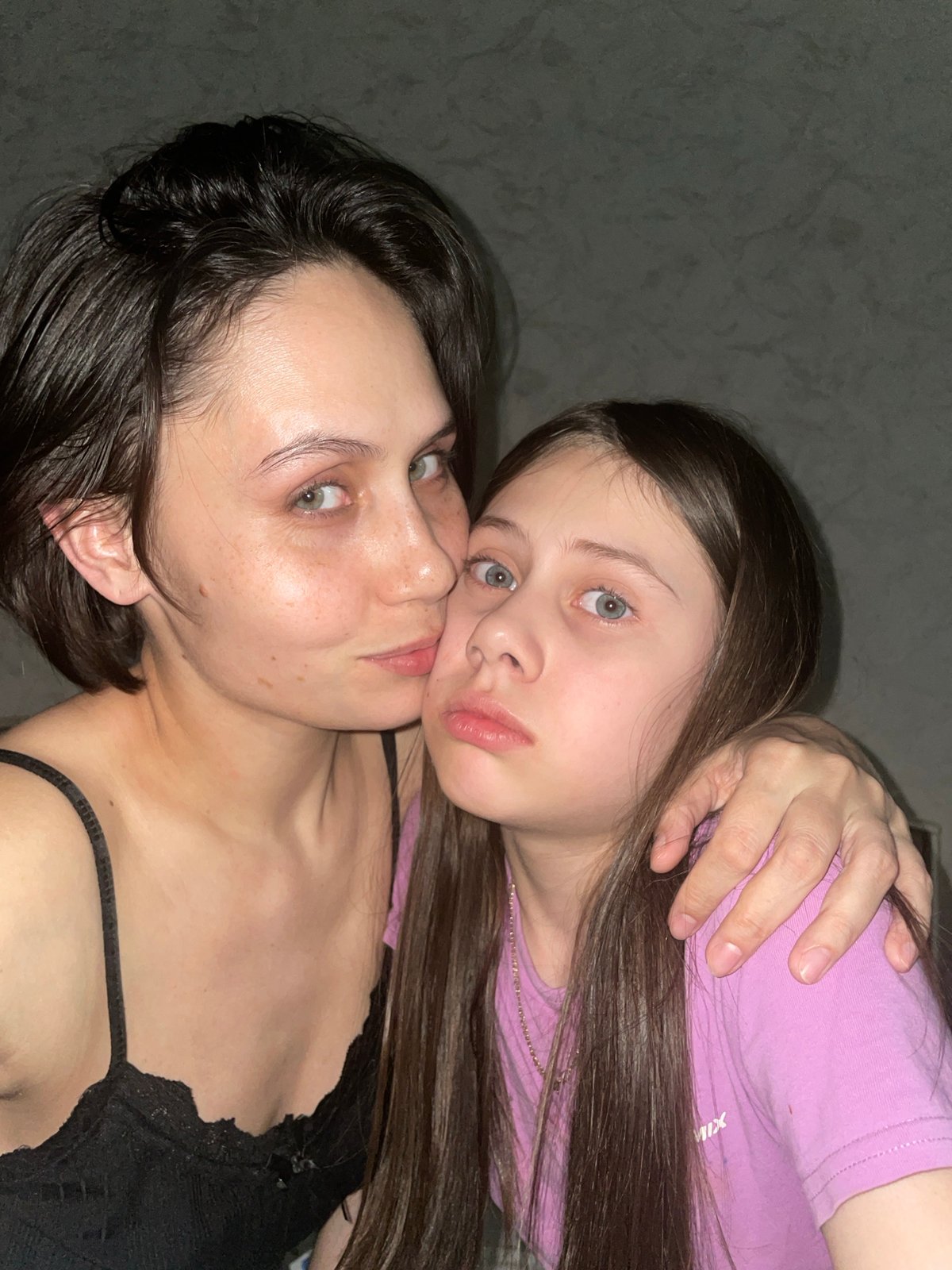 Mother and daughter share intimate portrait moment in Izhevsk