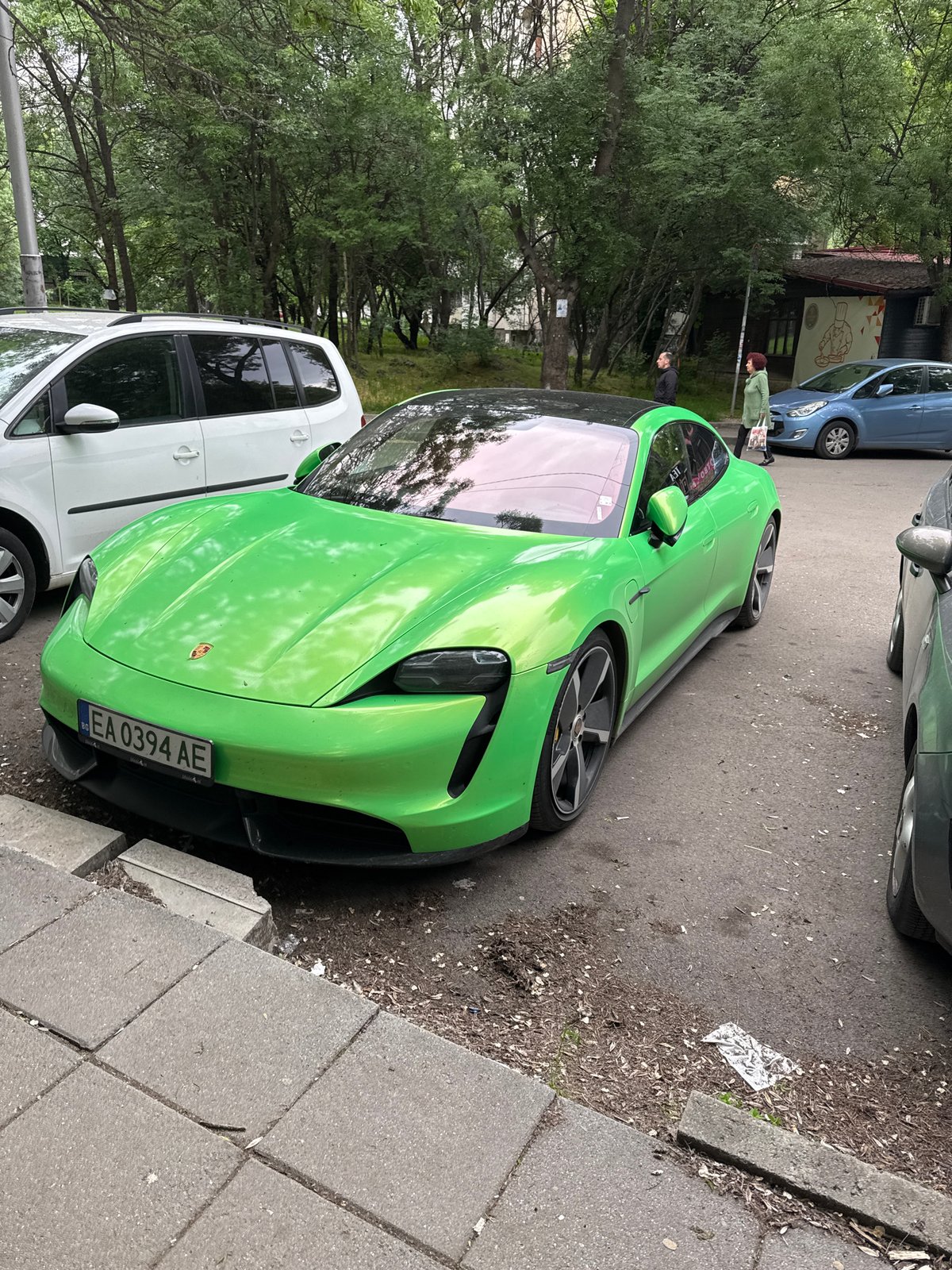 Lime-green Porsche spotted on Sofia street amid spring foliage