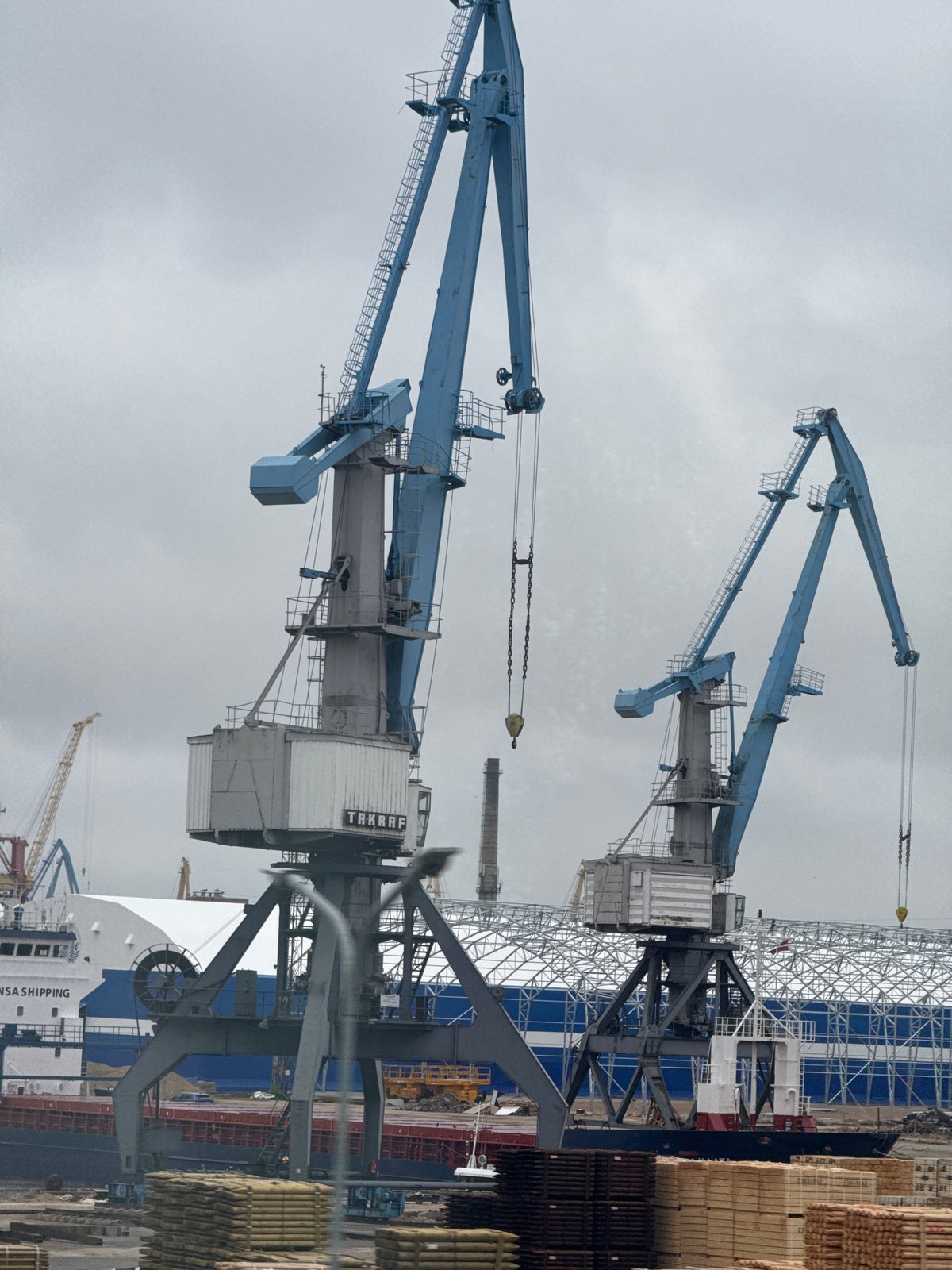 Harbor cranes and shipbuilding activity observed in Riga
