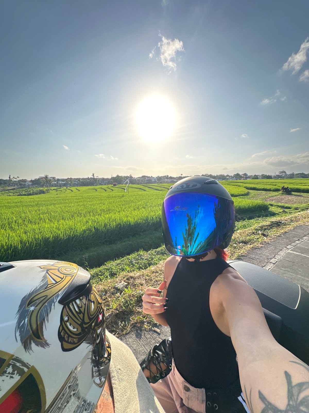 Morning motorcycle moments near Bali rice paddies