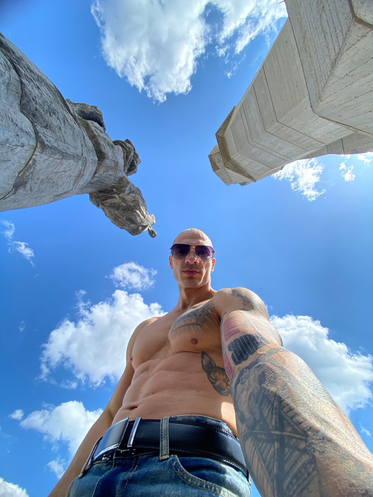 Tattooed man photographed against sky in Pleven, Bulgaria