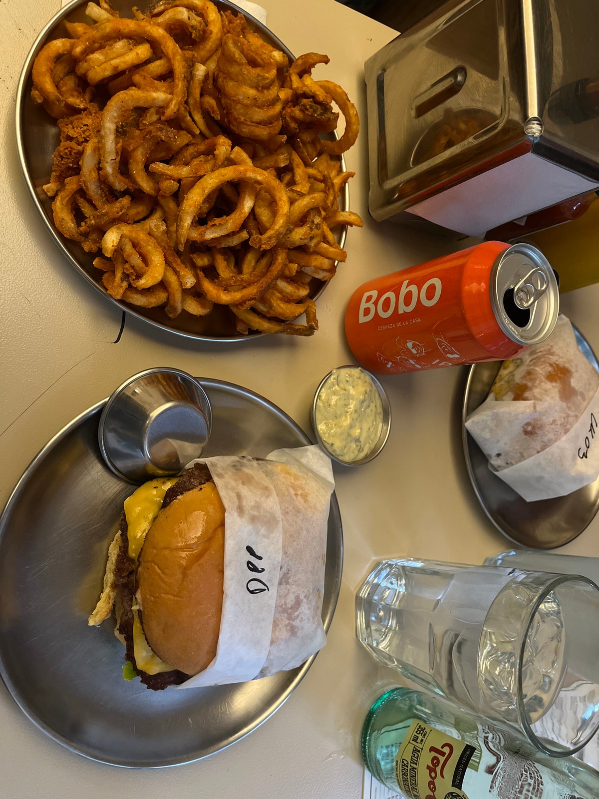 Late night burger meal documented at Mexico City restaurant