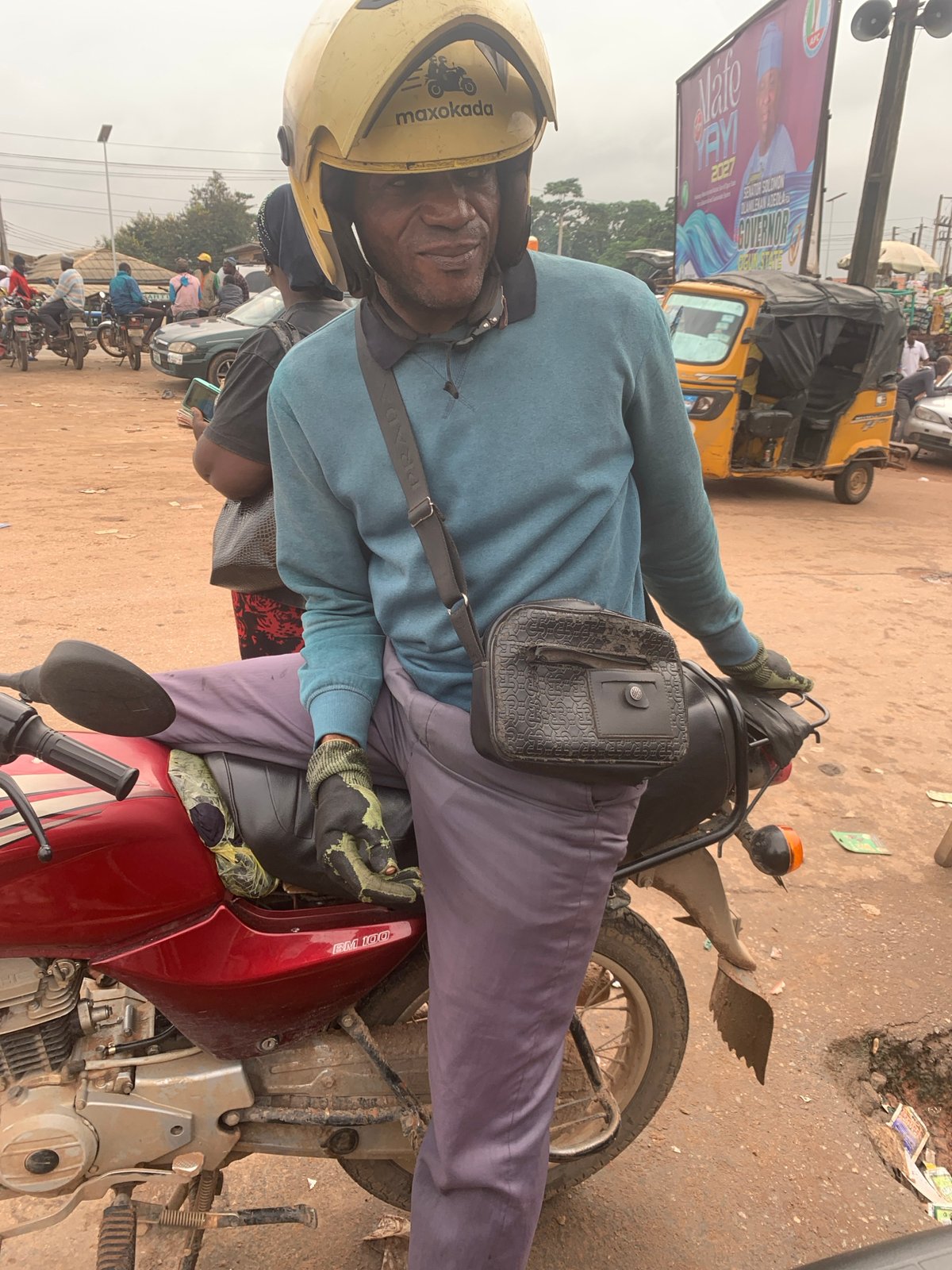 Street life at a Shagamu transport hub, July morning