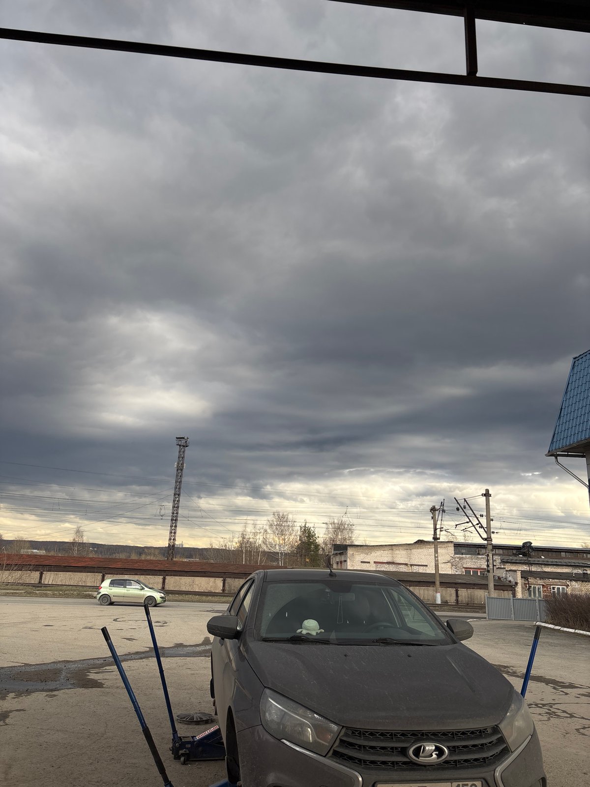 Lada vehicle spotted in industrial Perm under overcast skies
