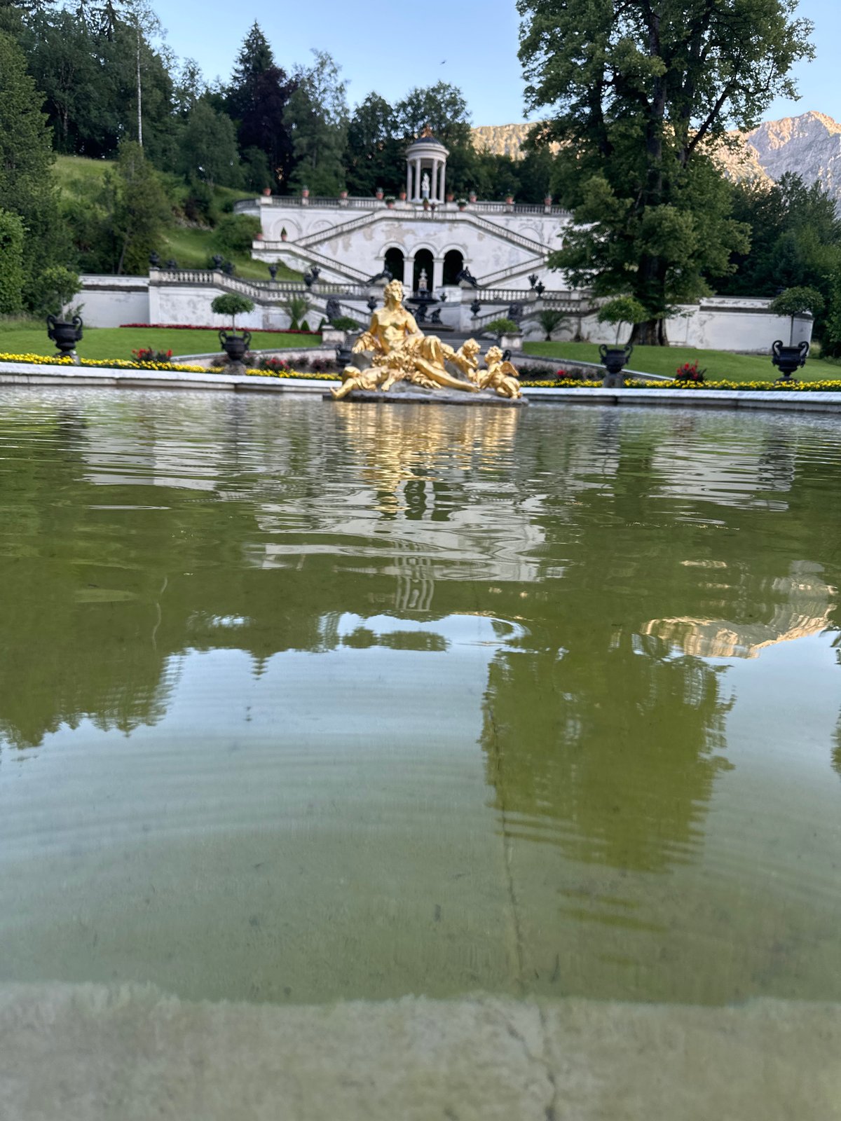 Exploring the gardens and statuary of a classical European palace