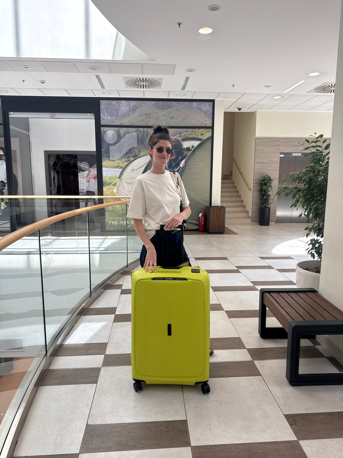 Traveler with yellow suitcase spotted amid Podgorica street scenes