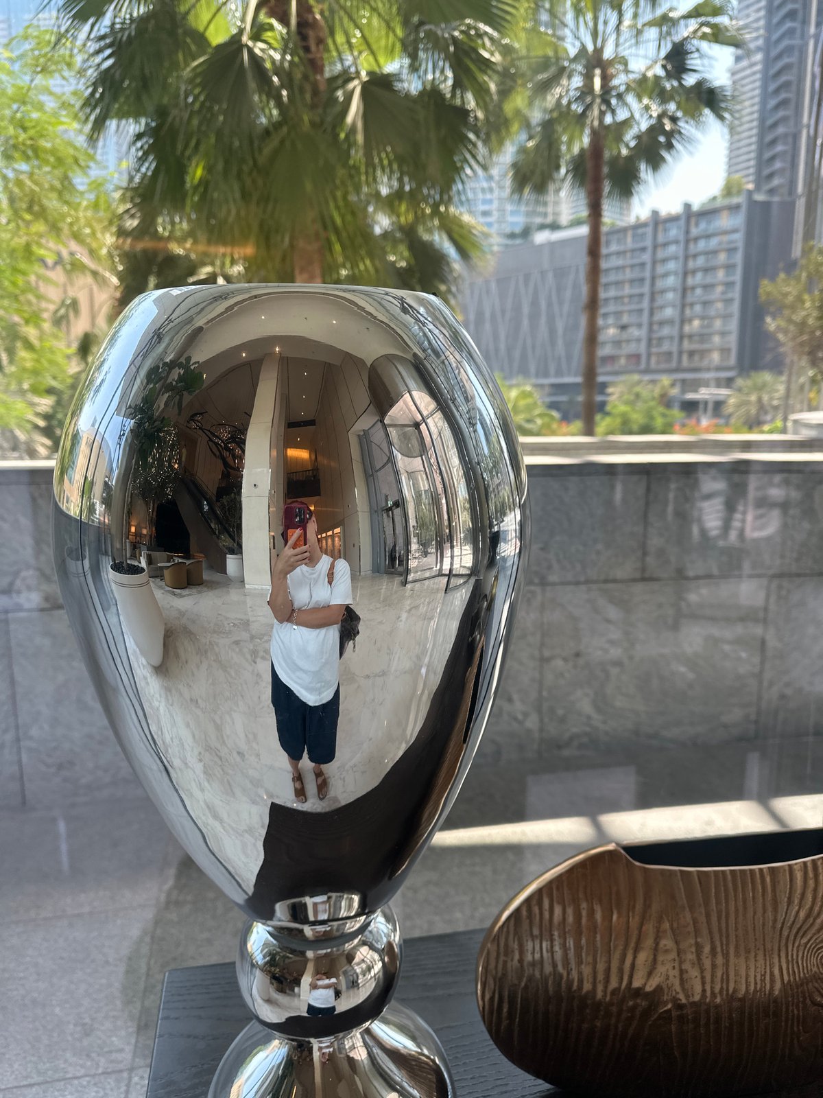 Morning around the Burj Khalifa plaza and a Dubai hotel lounge