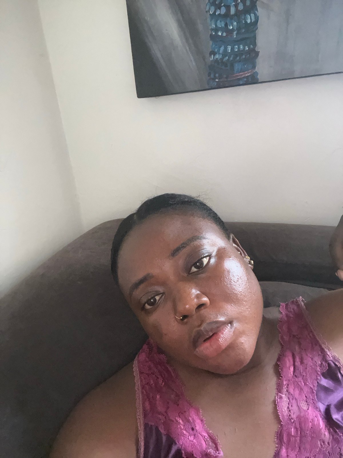 Woman photographed in purple lace outfit at Abuja residence