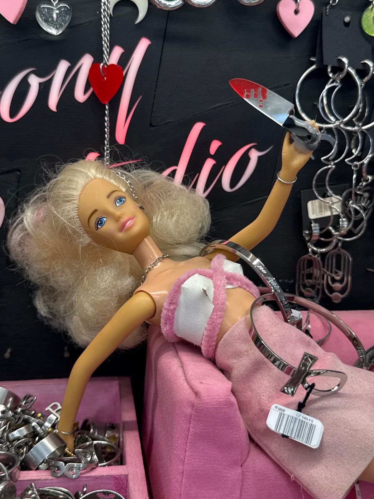 Moscow jewelry shop display styled with a Barbie doll prop