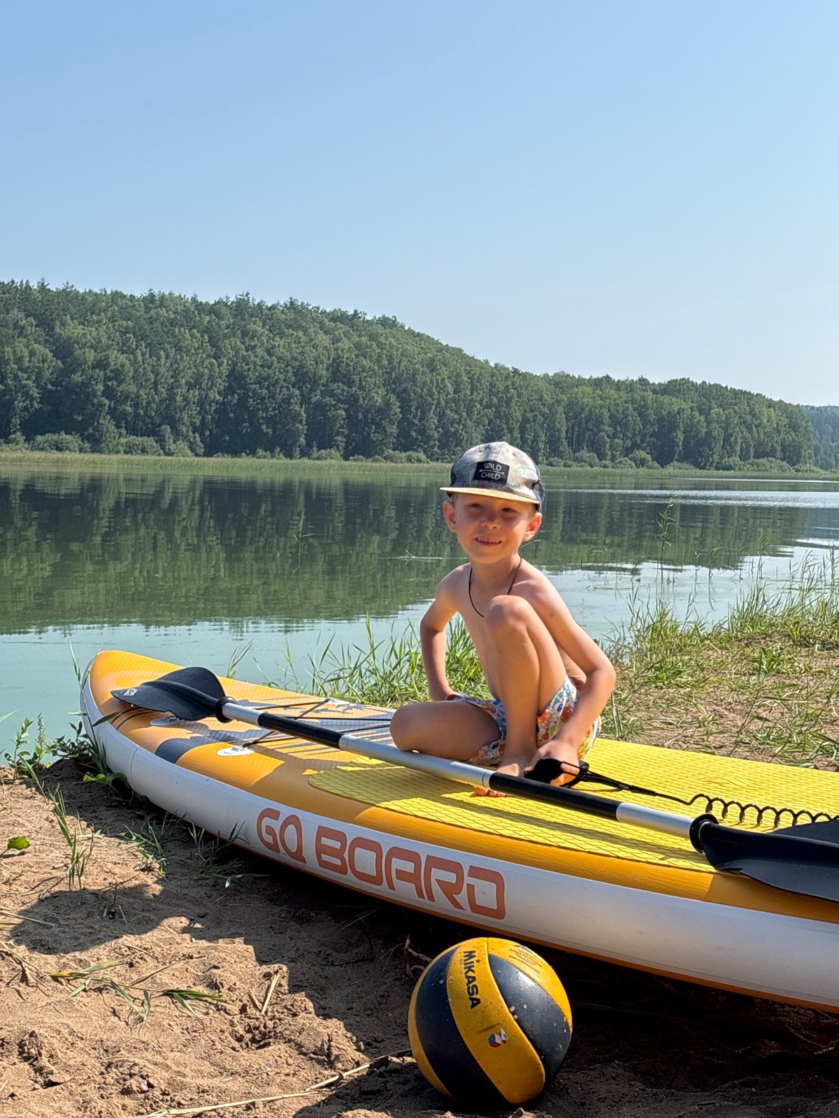 Paddleboard and volleyball day at a Chaykovsky lakeside