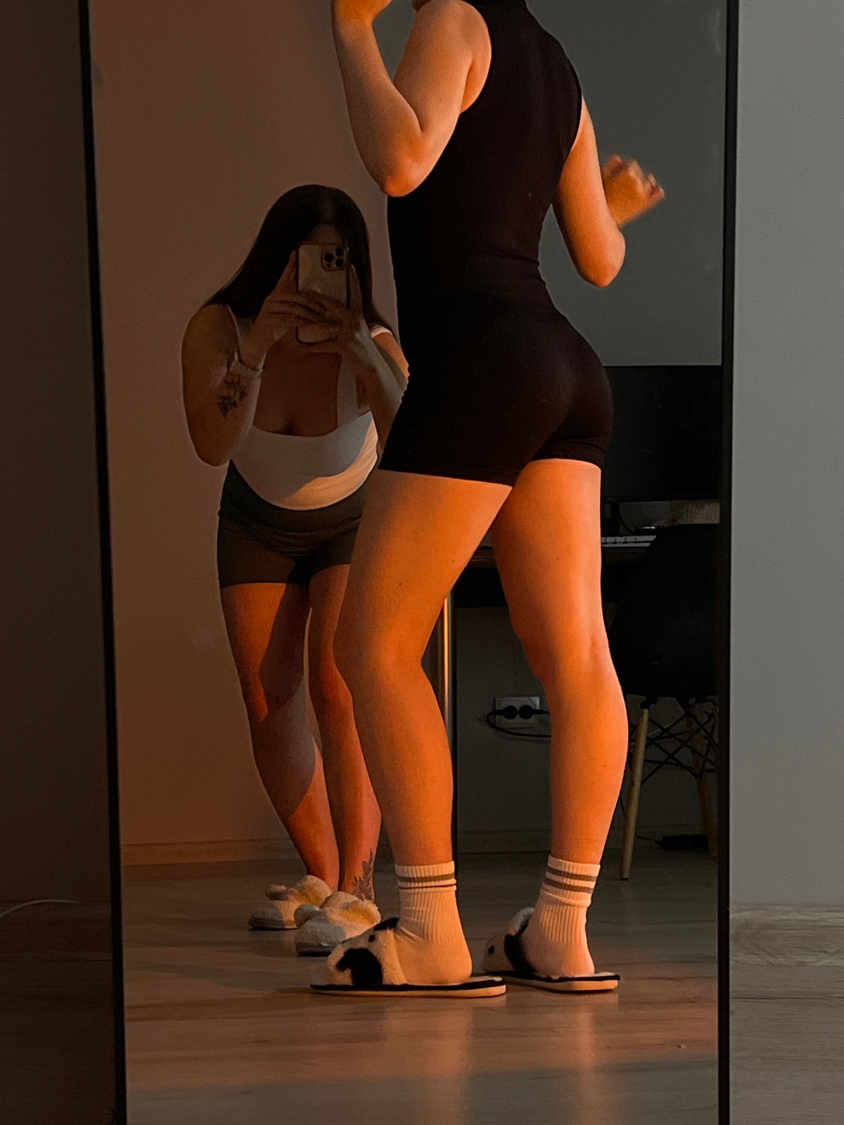 Mirror selfies captured in Ternopil residential spaces during evening