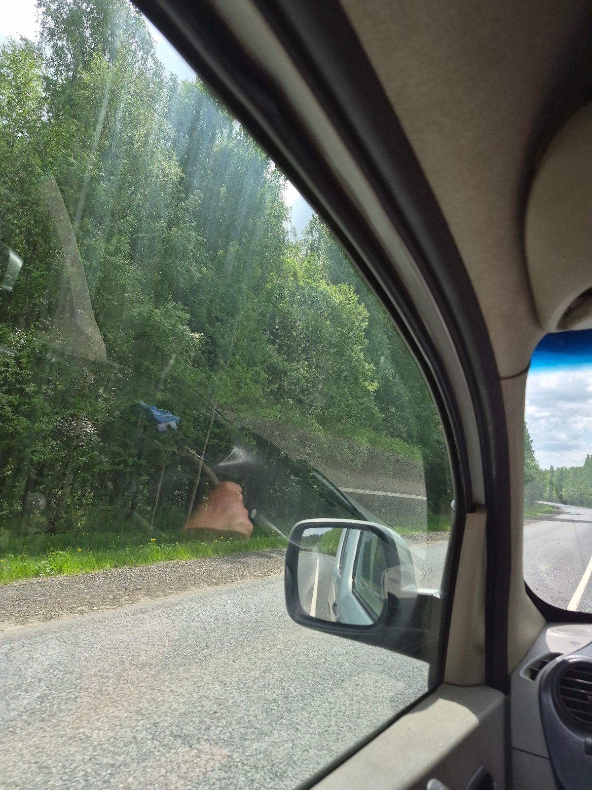 Morning drive through rural Chernovskoye captured by passenger
