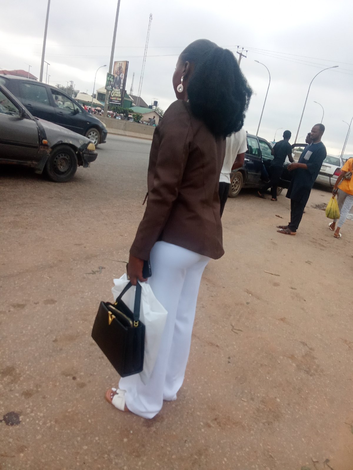 Morning street life along a busy Kagini highway
