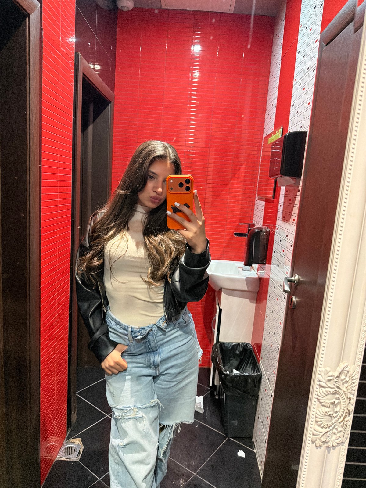Woman documents coffee shop visit in Pernik, Bulgaria