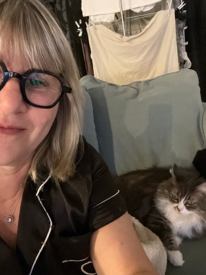 Woman documents evening routine with pets in French home