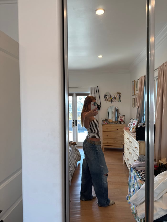 Woman takes mirror selfie in Los Angeles residence