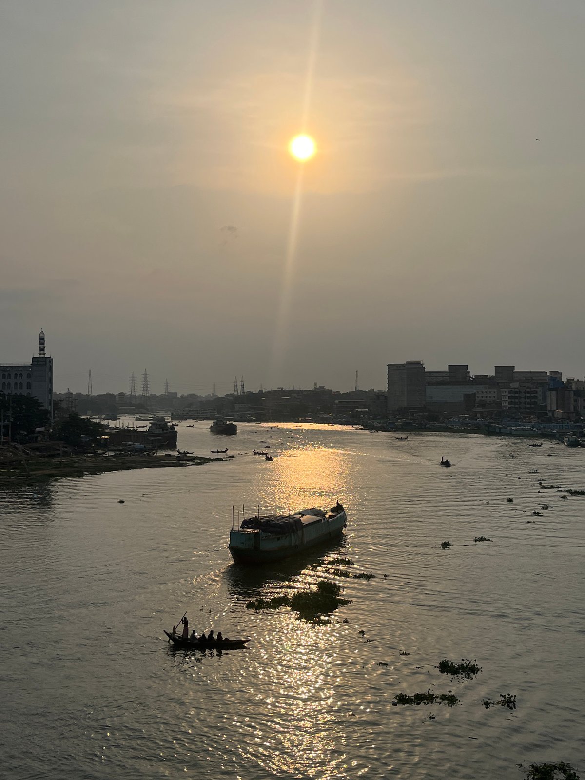 Daily life unfolds across Dhaka's rivers and markets