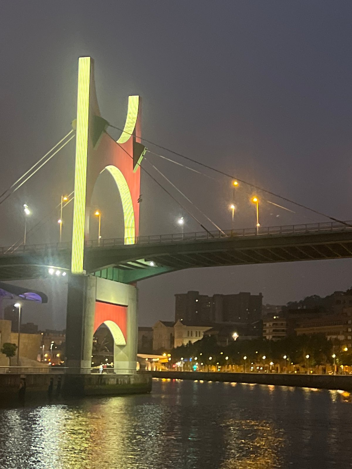 Night walk along Bilbao's Nervión riverside landmarks