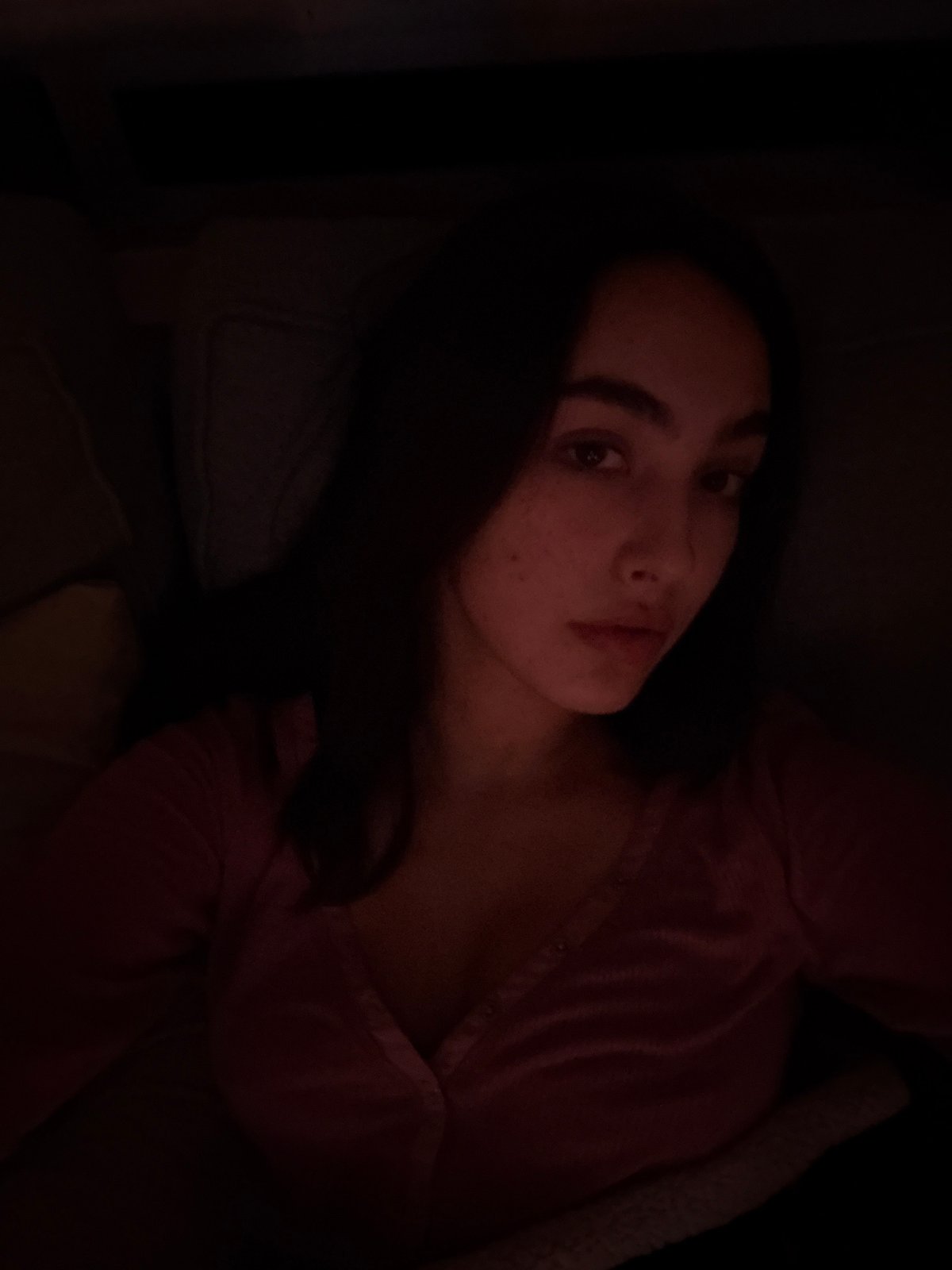 Woman rests indoors during early morning hours in Mexico City