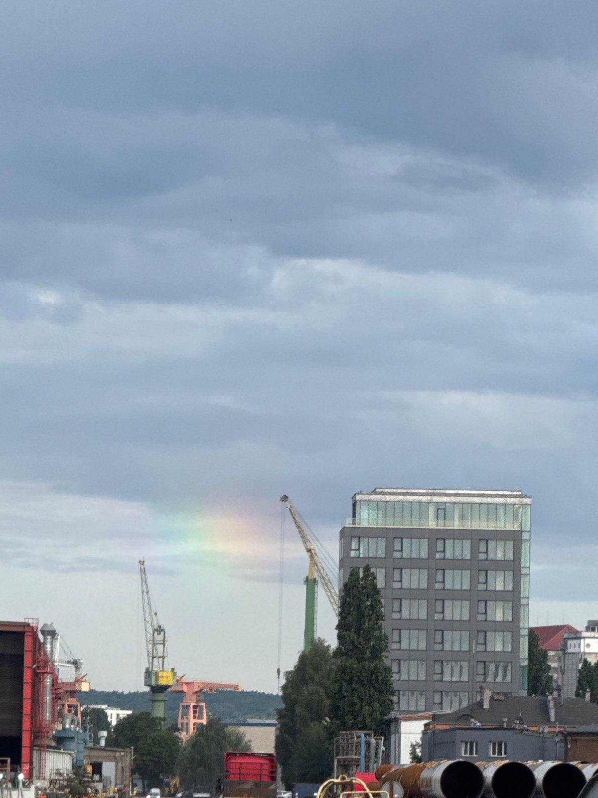 Gdańsk port and shipyard on a grey summer morning