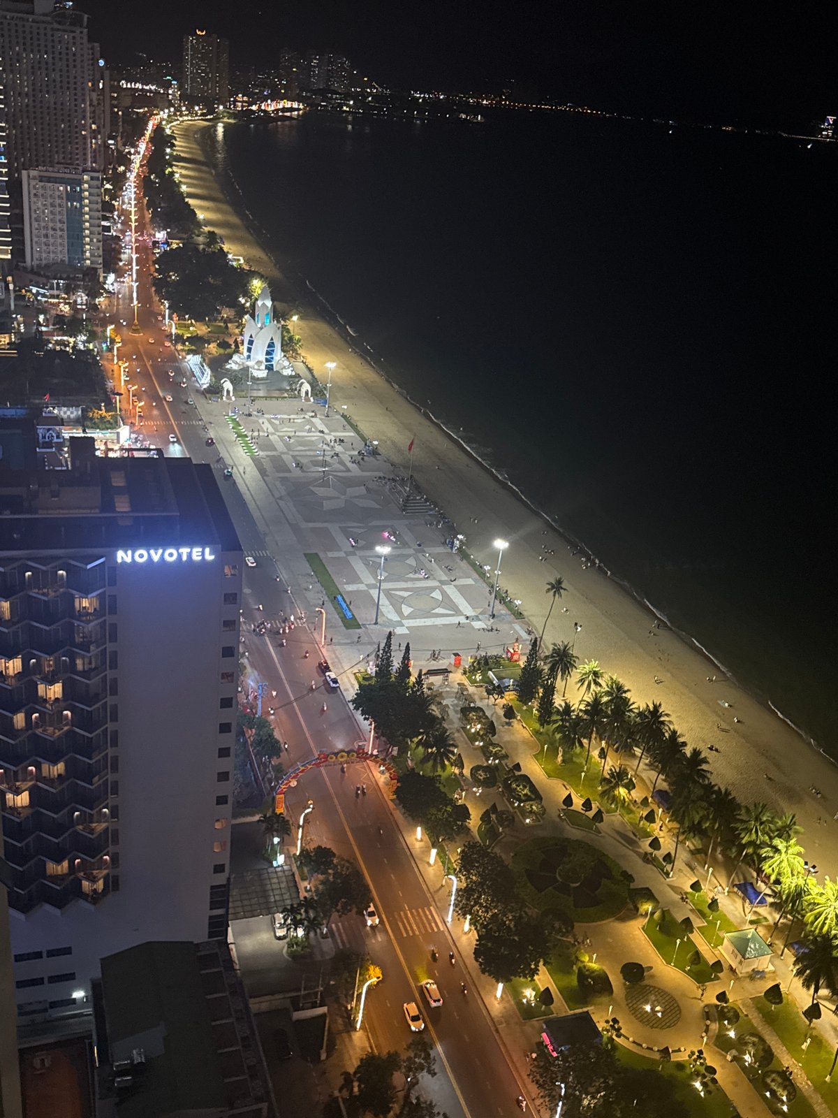 Witness documents coastal city nightlife near Novotel hotel