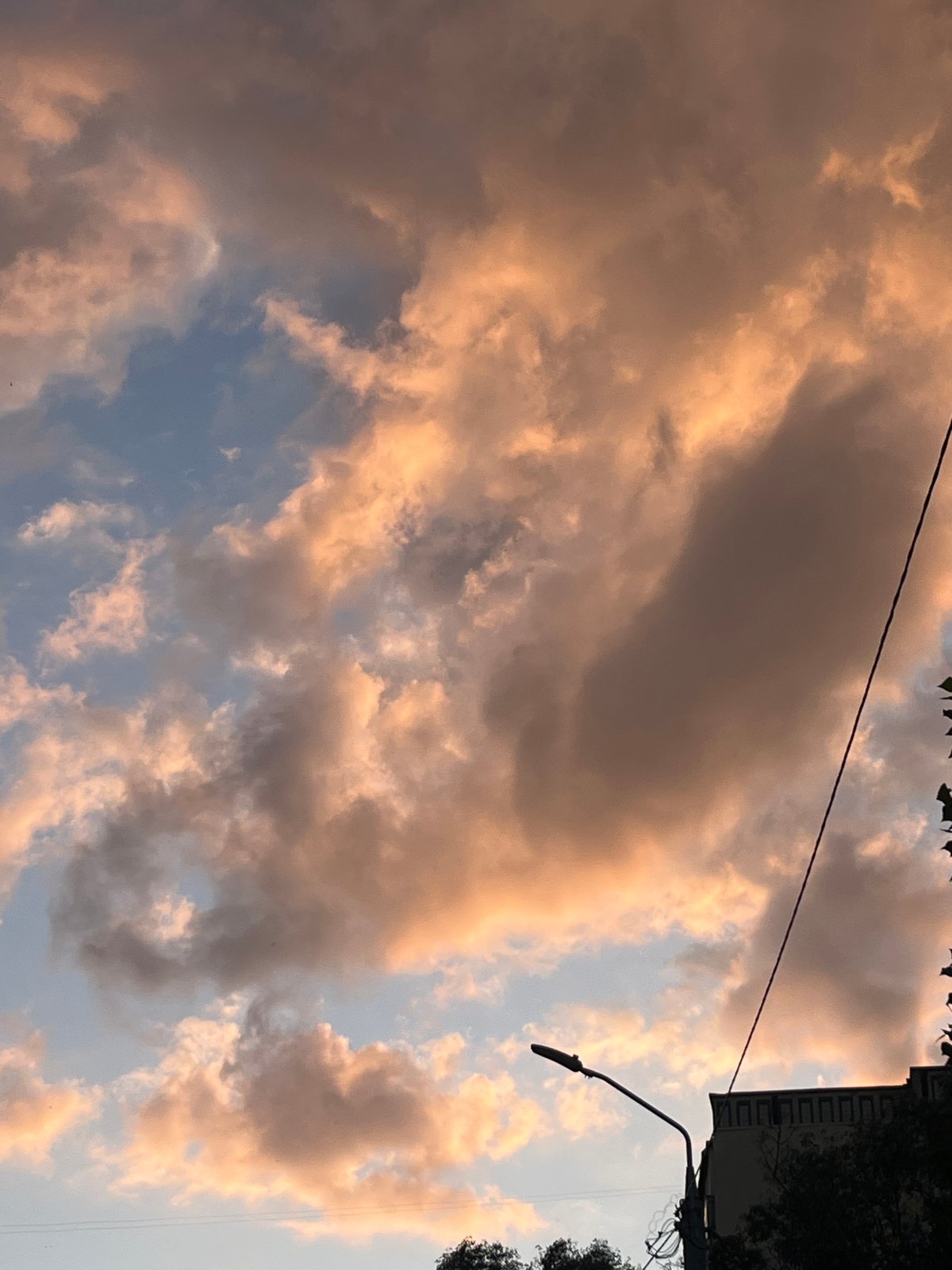 Warm sunset clouds over Dnipro, Ukraine