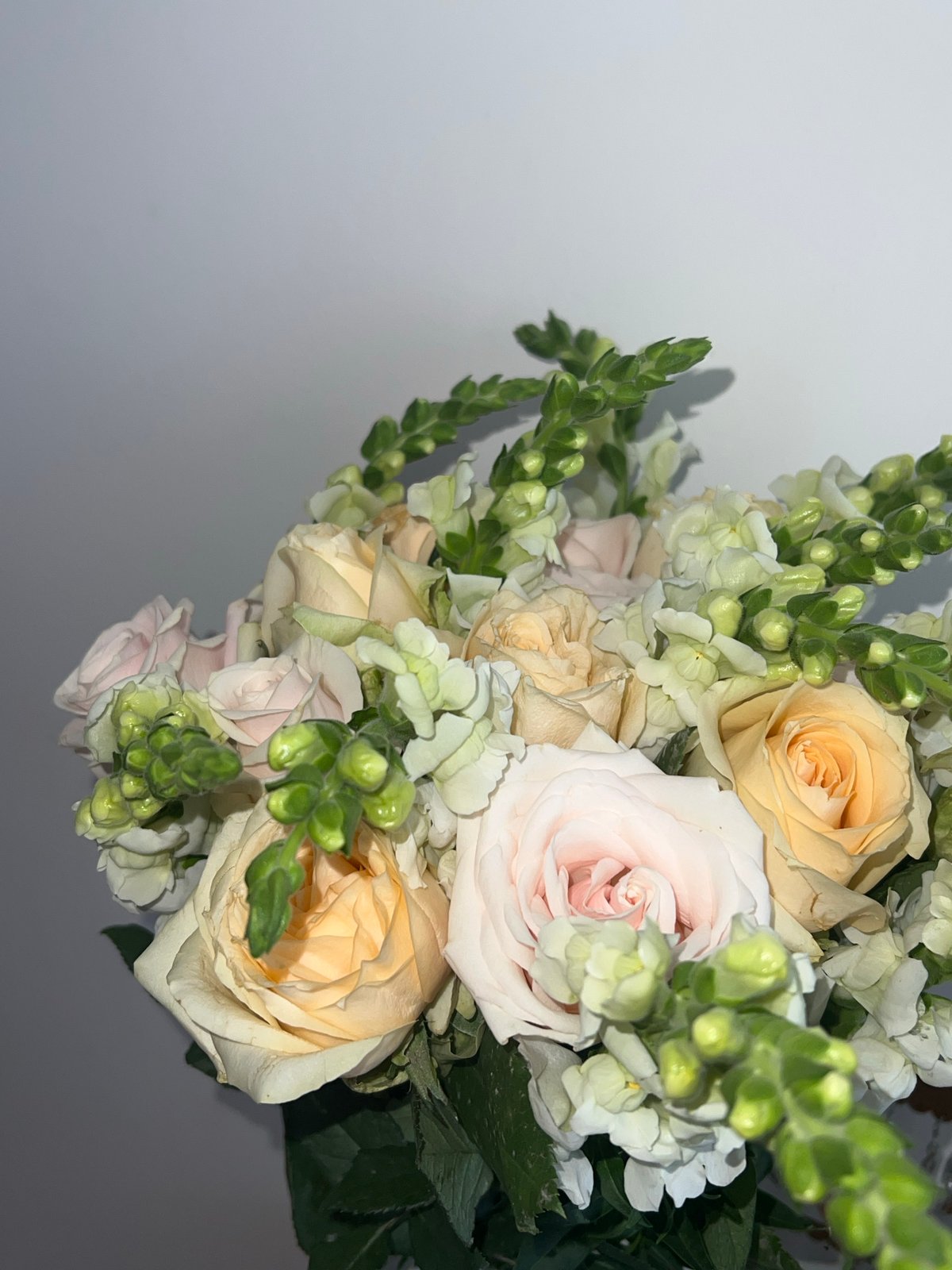Peach and pink rose bouquet photographed in Nha Trang