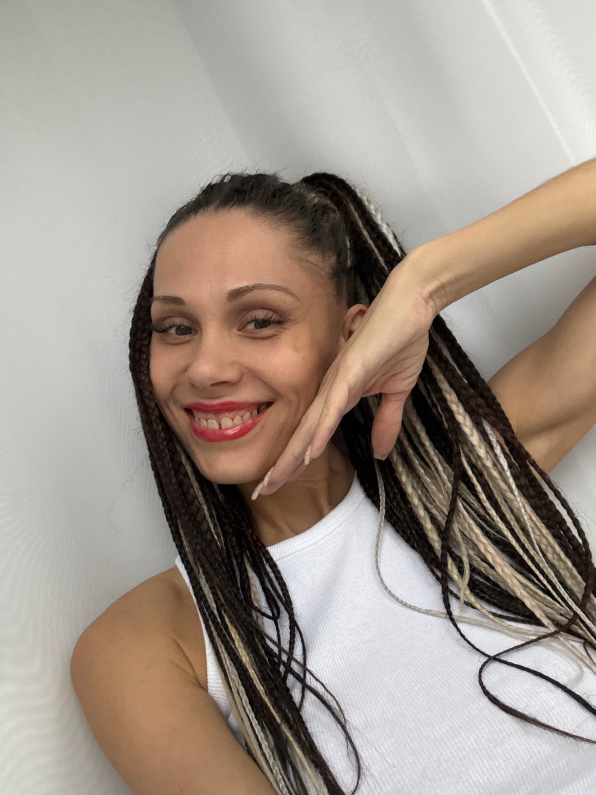 Woman with braided hair photographed in Rusanovo, Russia