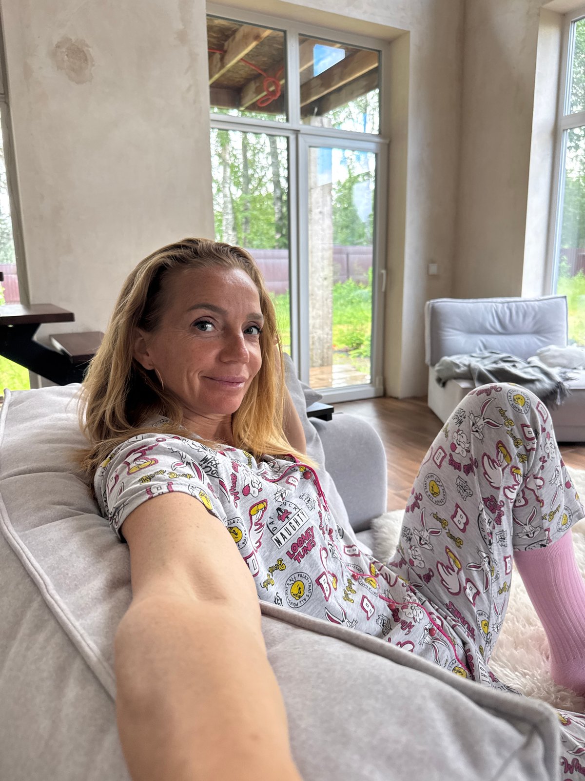 Lazy morning at home: coffee, a Siamese cat, and garden views