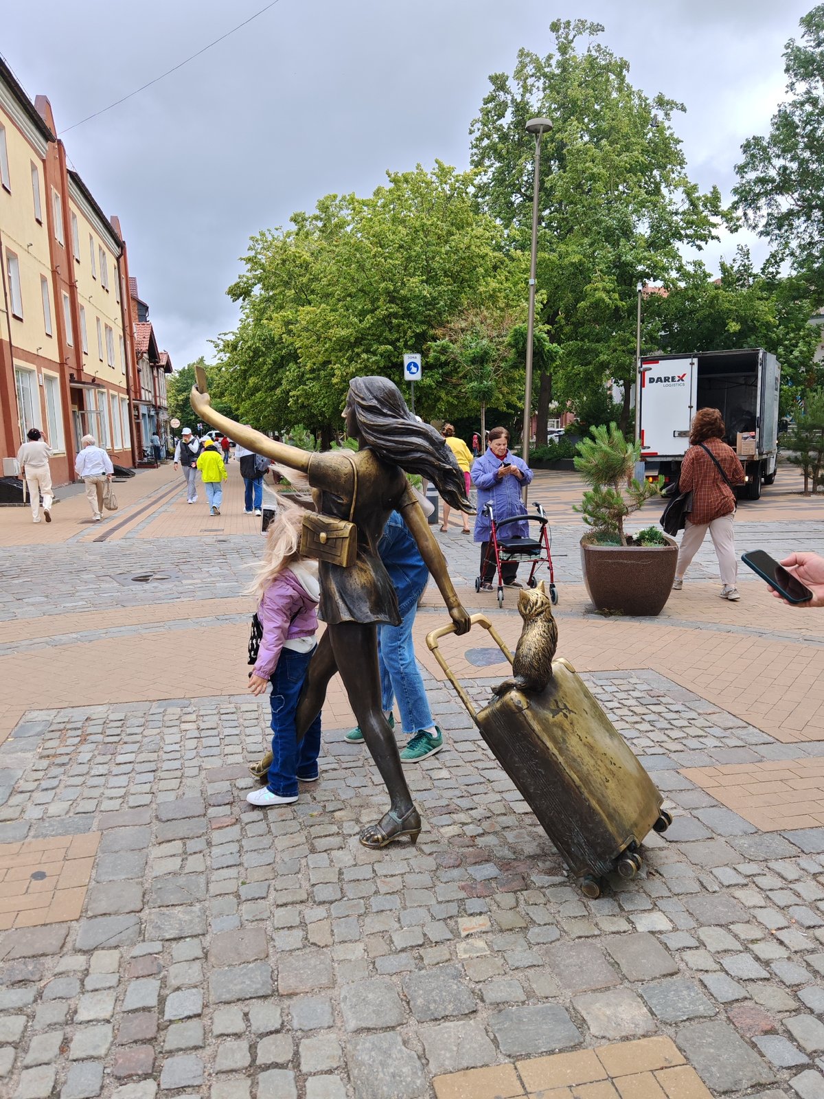 Exploring a Baltic coastal town's street art, cat statues, and history museum