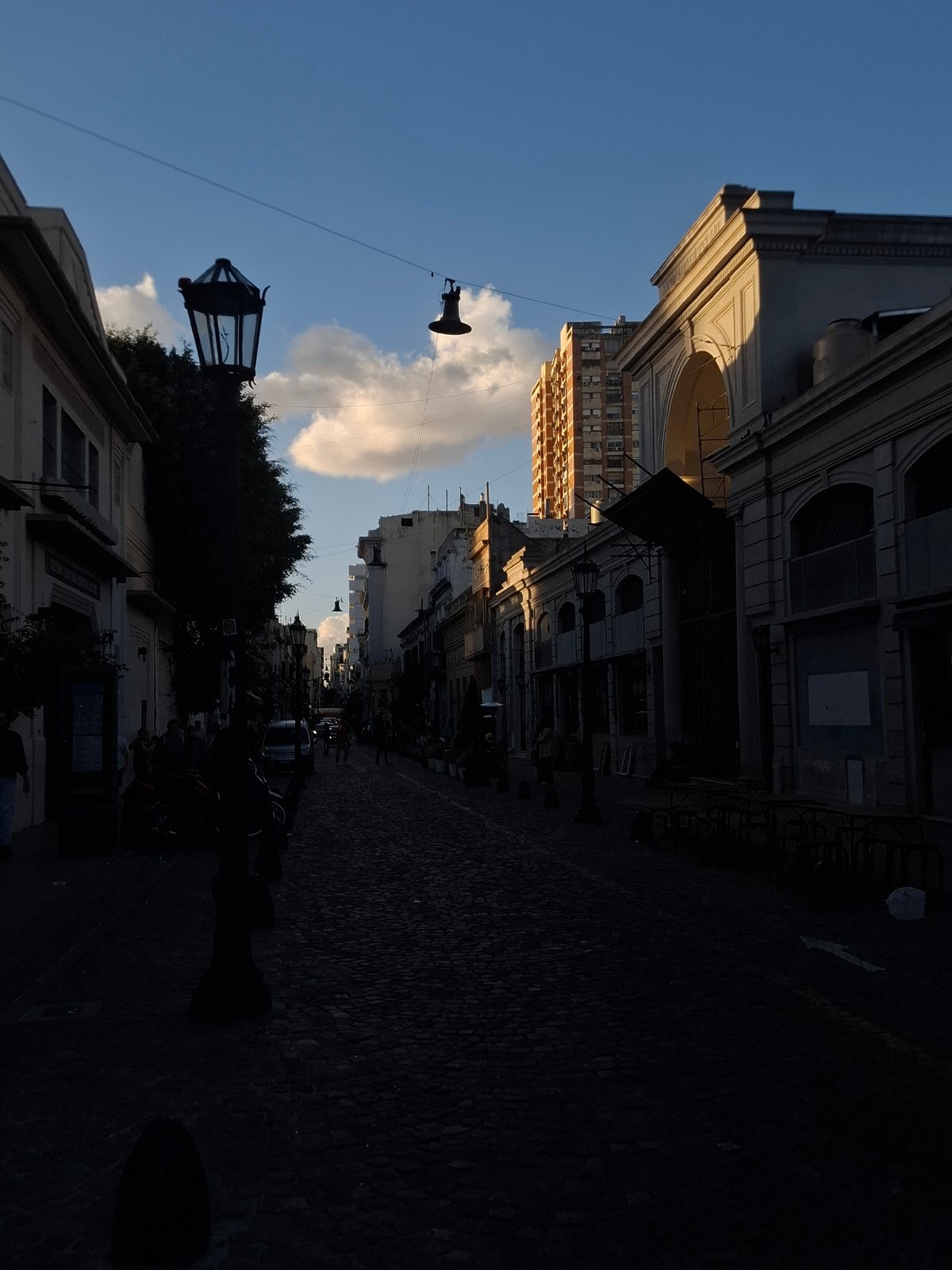 Evening street life documented in historic Buenos Aires district