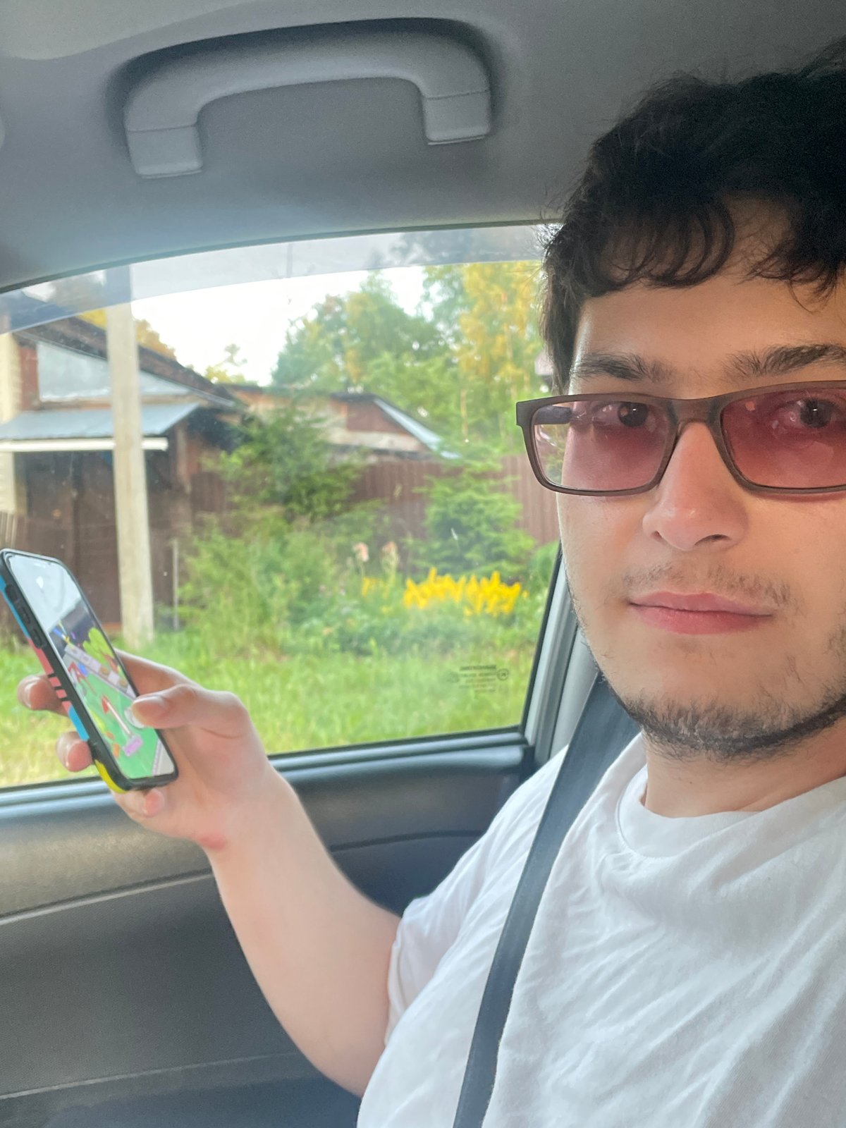 Cruising Votkinsk streets, phone out, vape in hand