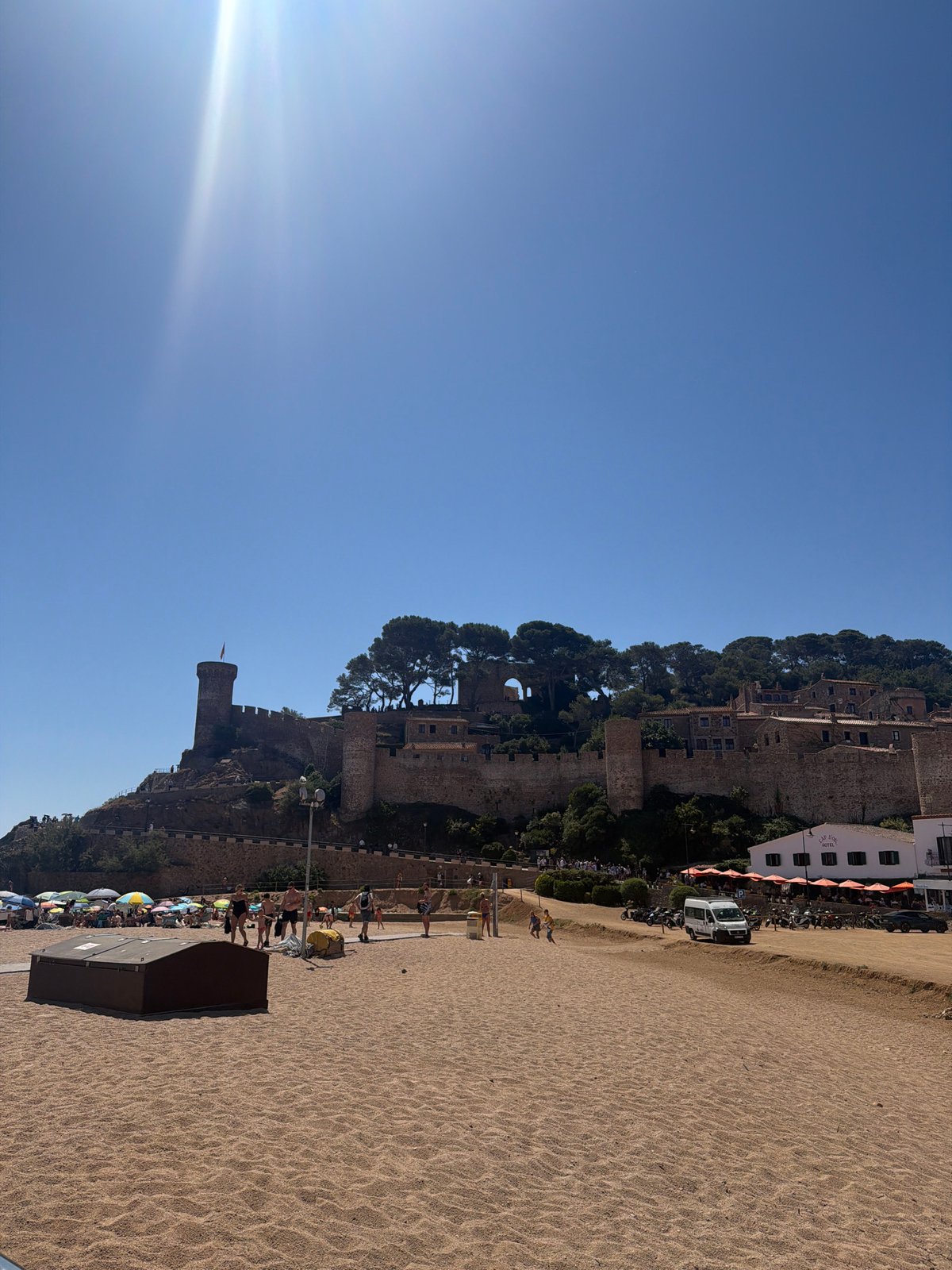 Boat trip along a Mediterranean coast with castle views