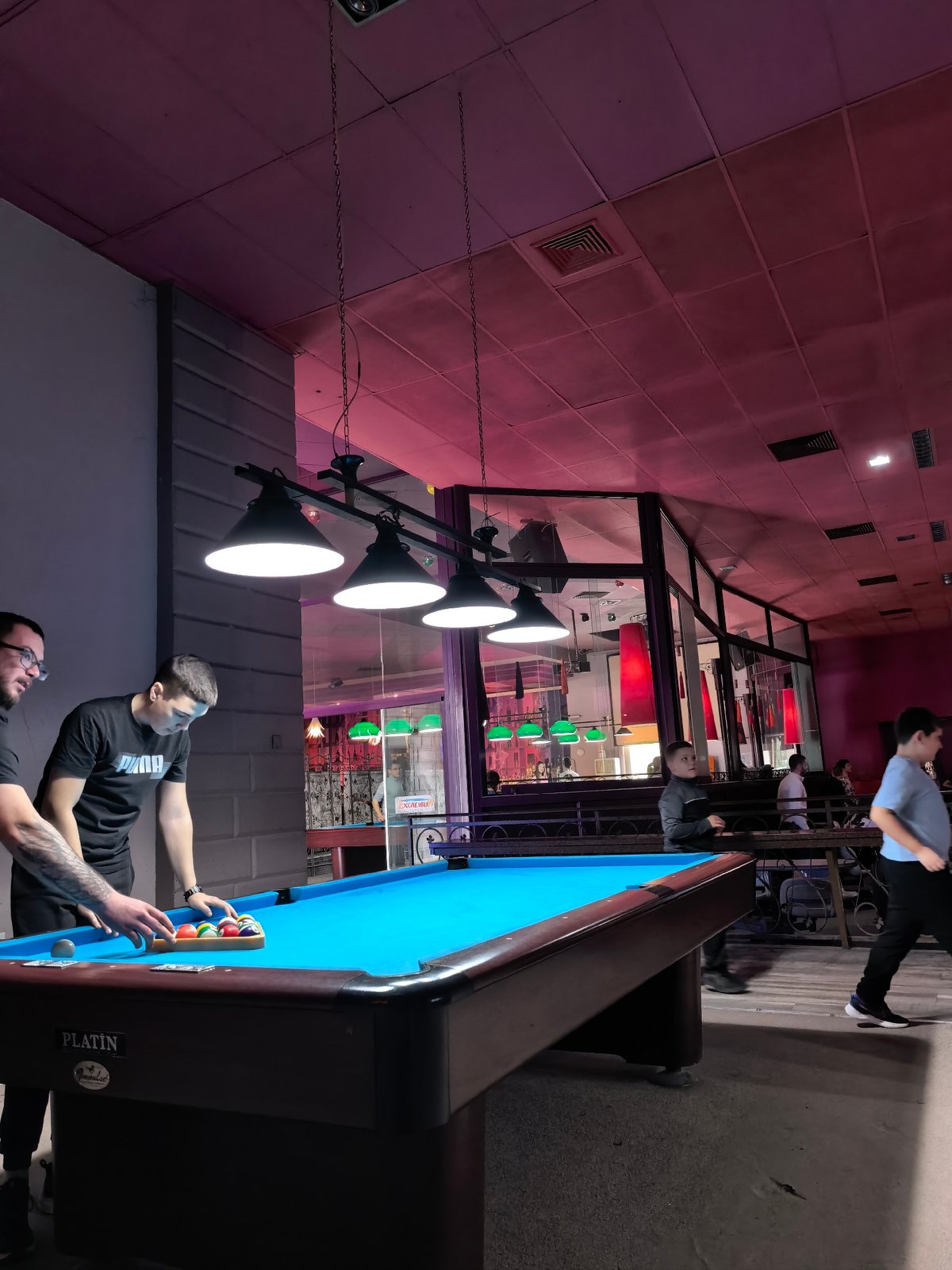 Men play pool at recreation center in Plovdiv