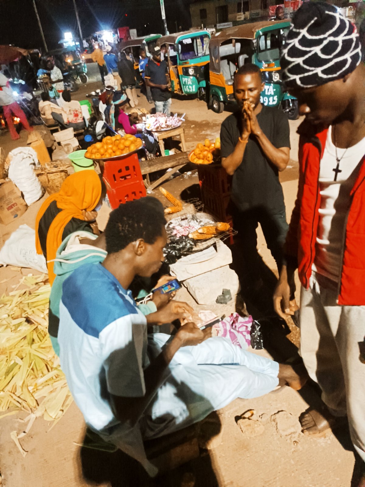 Evening street life unfolds in Bukuru, Nigeria