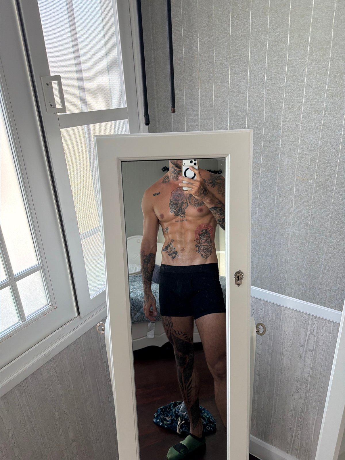 Late-night bathroom selfies captured in Chalong, Thailand residence