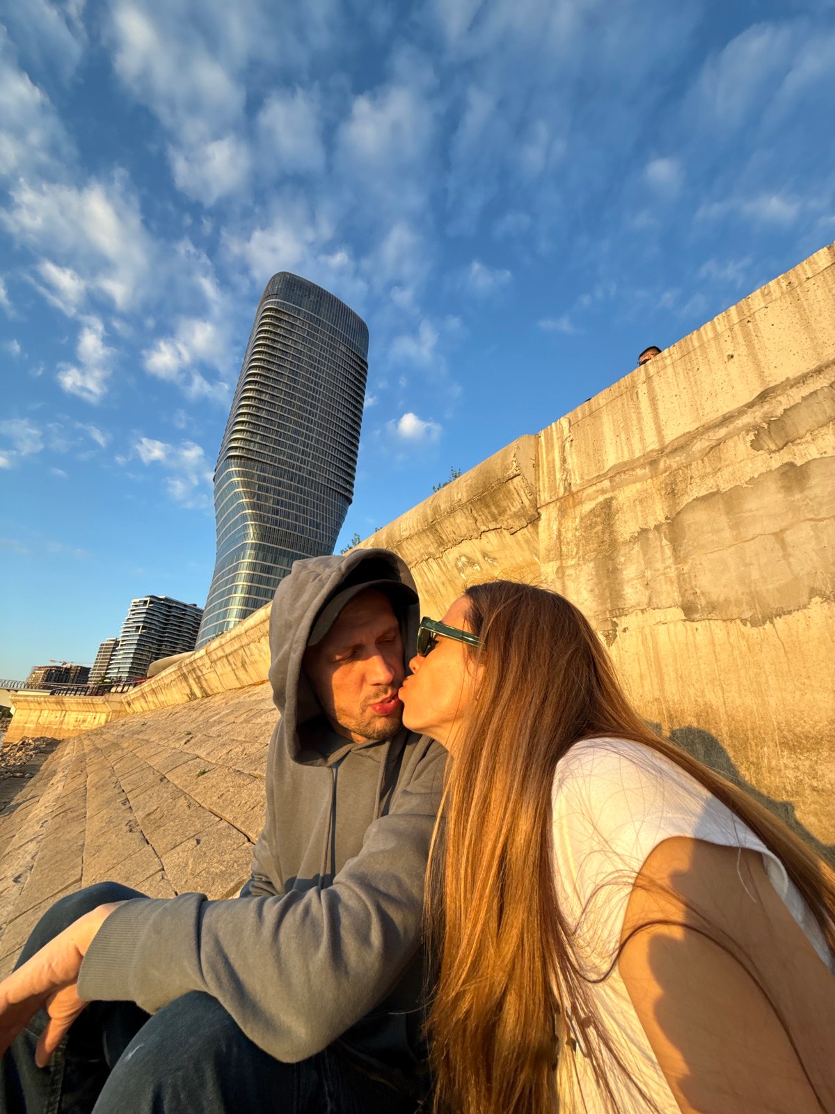 Couple shares intimate moment in golden Belgrade evening light