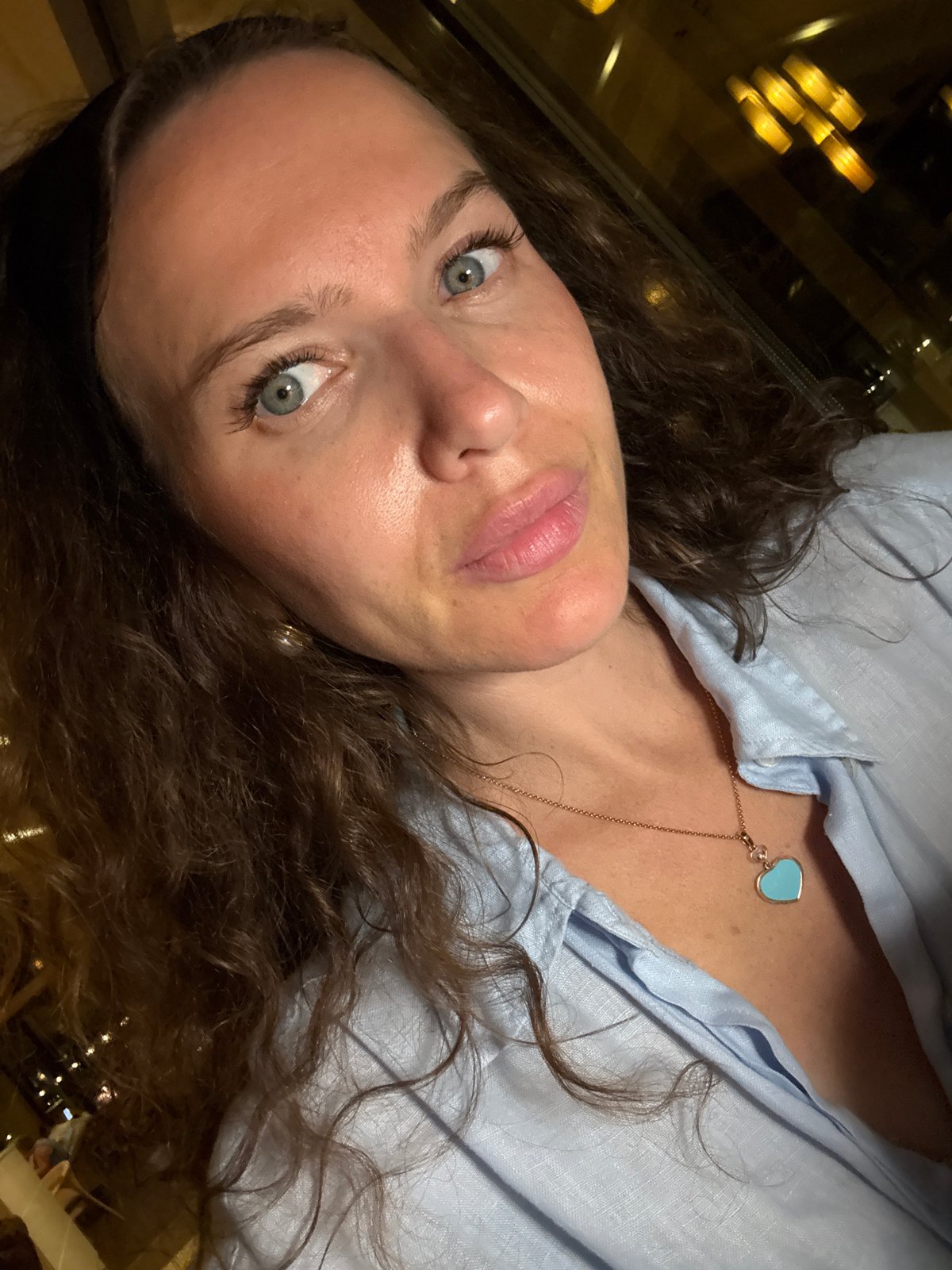 Woman documents evening selfies and resort visit in Dubai