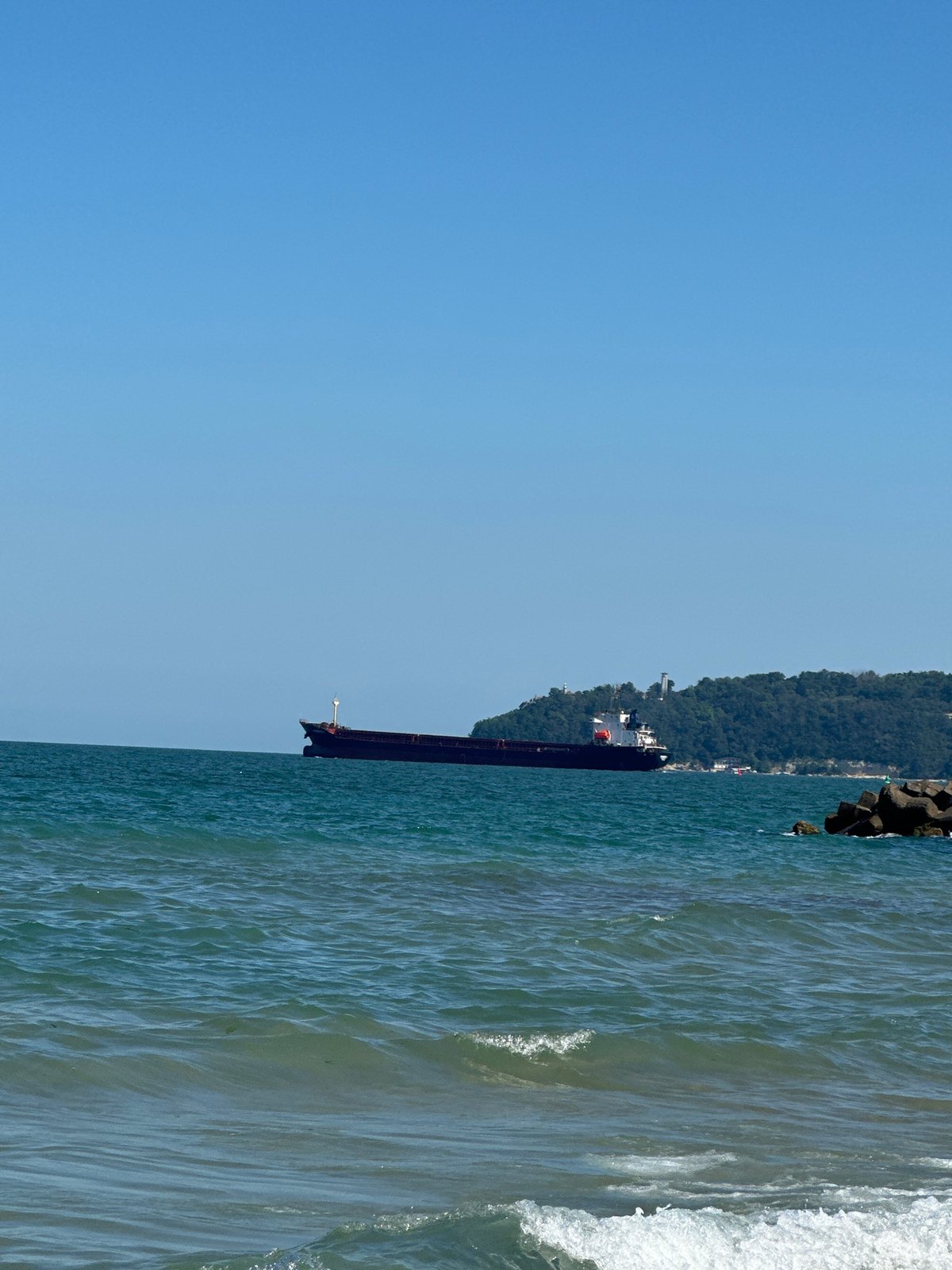 Sunny afternoon on Varna's Black Sea beach and port