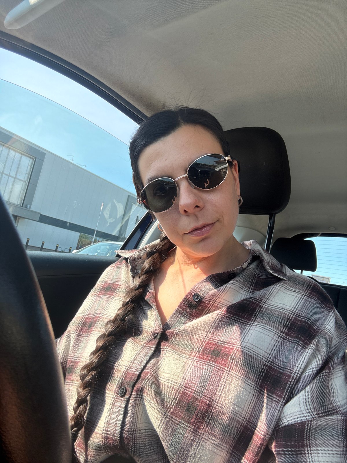Woman takes selfie in vehicle in Great Yarmouth