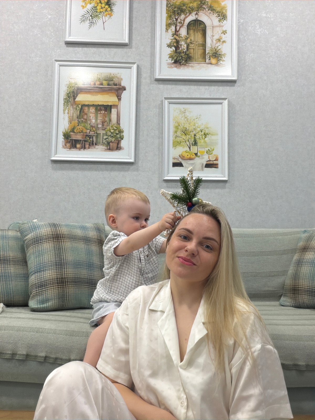 Family moments with blonde woman, toddler, small dog documented Votkinsk