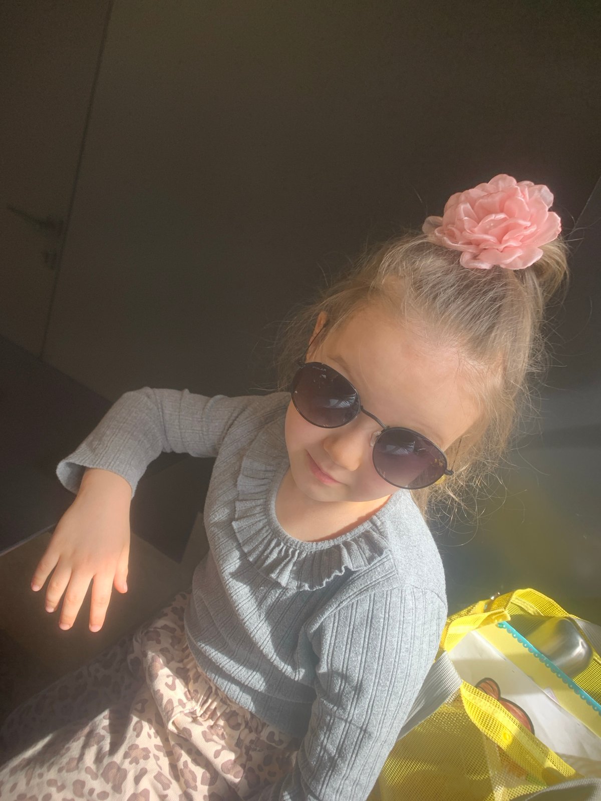 Girl in sunglasses and flower accessory photographed in Izhevsk